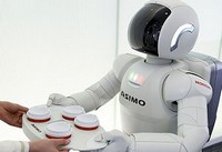 Honda's Asimo robot turns 9. Shakes a leg.