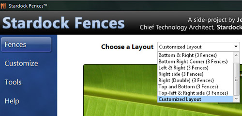 Fences desktop icon organiser for Windows. It's great.