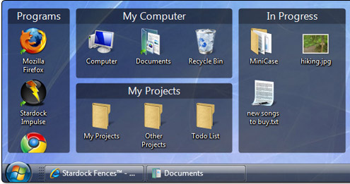 Fences desktop icon organiser for Windows. It's great.