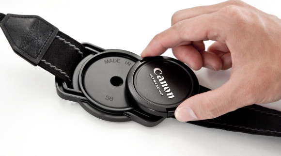 Novel lens cap strap holder claims to be a strapping solution for losing lens caps