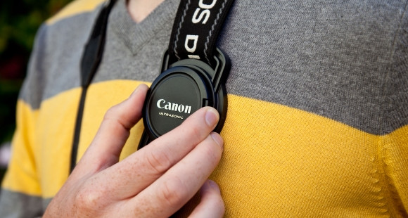 Novel lens cap strap holder claims to be a strapping solution for losing lens caps