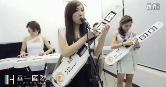 Seen playing live on a Chinese TV station is the Transformers Girl Band who make their music using curious instruments made from Android-powered tablets and smartphones. Pin It