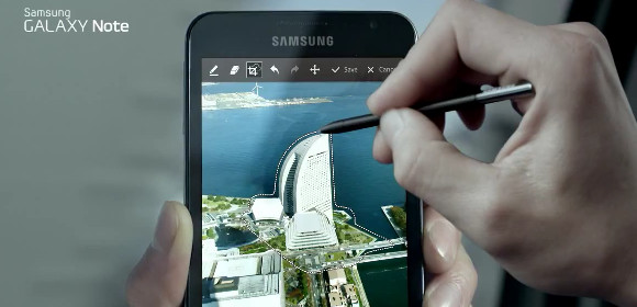 We’re growing rather partial to Samsung’s intriguing tablet-cum-smartphone, the Galaxy Note, and a new TV advert shows off its massive screen and sketching abilities, courtesy of a  capacitive stylus. Pin It
