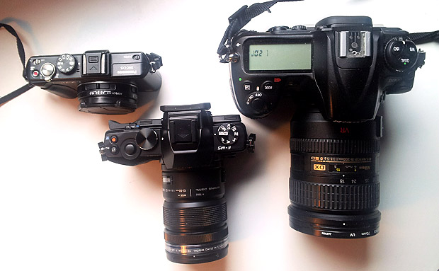 Olympus OM-D size comparison with Lumix LX5 and Nikon D300