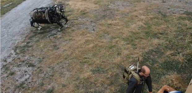 Nightmare-inducing DARPA Big Dog robot follows its master through the woods